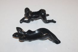 Two pipe rests in the form of female figures