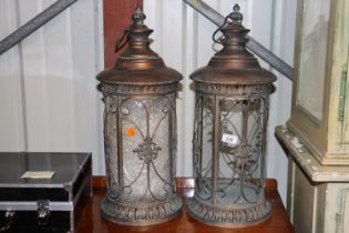 A pair of copper lanterns