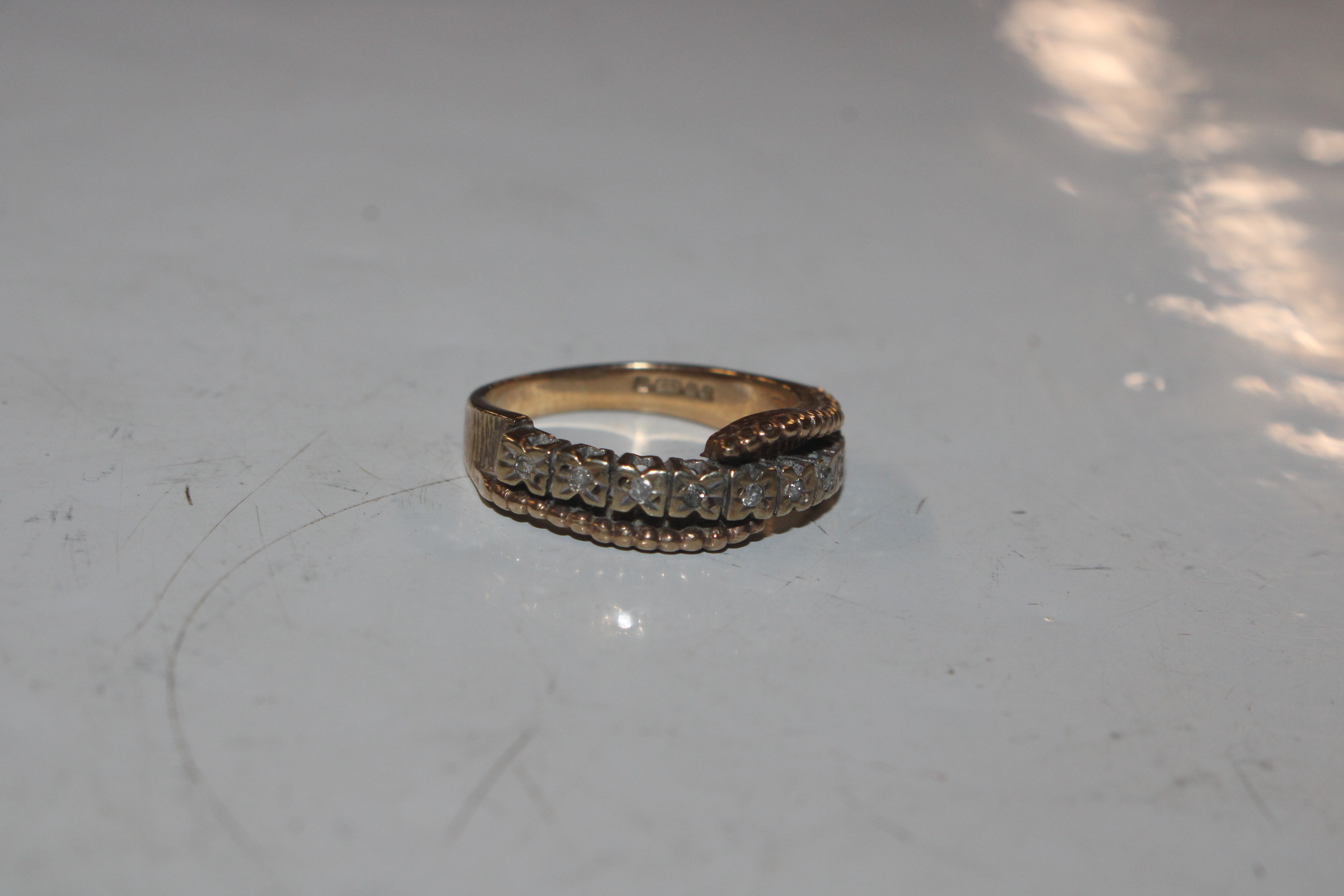 A 9ct gold half eternity ring set with chip diamon - Image 6 of 10