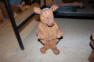 A rusty cast iron model of a pig