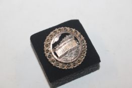 An antique Grand Tour Sterling silver brooch with