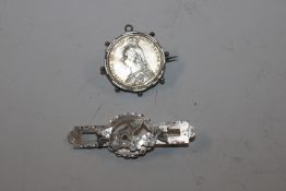 An 1897 Victoria Jubilee Sterling silver brooch an