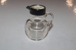 A glass and silver mounted match striker in the fo