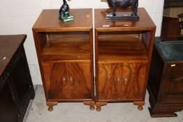 A pair of Herbert E. Giles walnut bedside cupboard