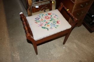 An Edwardian piano stool