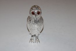 A silver plated sugar sifter in the form of an owl