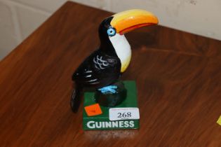 A cast iron Guinness style toucan