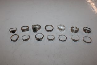 A box containing 925 silver and other dress rings