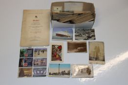 A box of various post-cards and ephemera