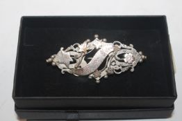 A 1905 Chester Sterling silver Ward Bros. brooch