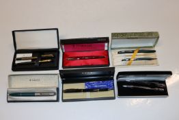 A Parker fountain pen in box, a cased pair of Boot