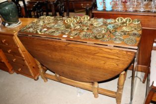 An oak gate leg dining table