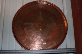 A large Eastern engraved copper tray