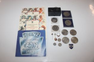 A quantity of various coinage; a pair of cuff-link