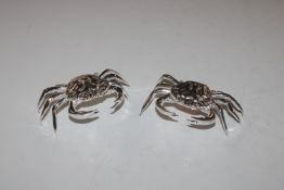 A pair of silver plated salts in the form of crabs