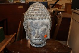 A Buddha head ornament
