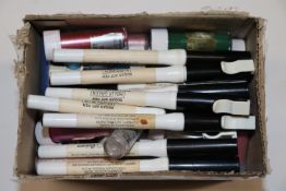A box containing sugar art pens and edible lustre