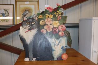 John Butler, a painted dummy board depicting cat a