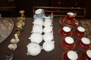 An Italian Ronzan model of a cockerel and a collection of Royal Doulton "Reflection" tea ware