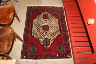 A red patterned rug