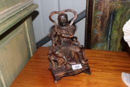 A bronze Chinese figure