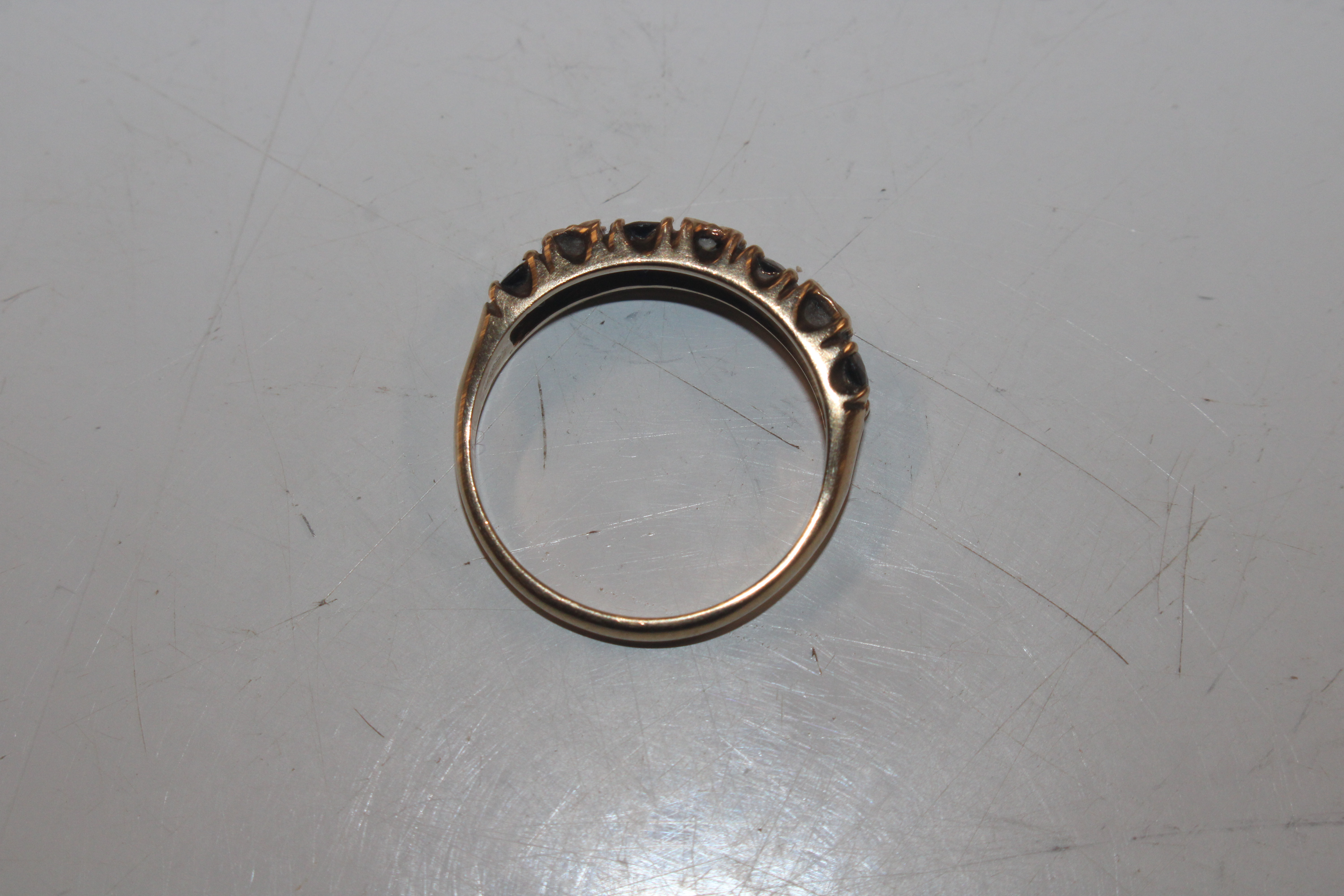 A 9ct gold half eternity ring set with chip diamon - Image 4 of 10