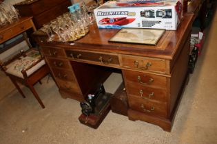 A mahogany pedestal writing desk