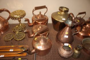 Three antique copper kettles