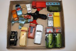A box of Dinky die-cast vehicles
