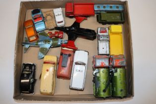 A box of Dinky die-cast vehicles