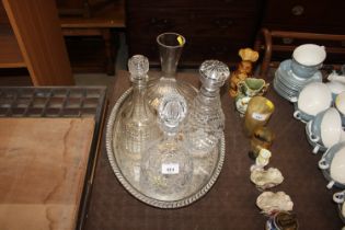A silver plated galleried tray and four glass deca