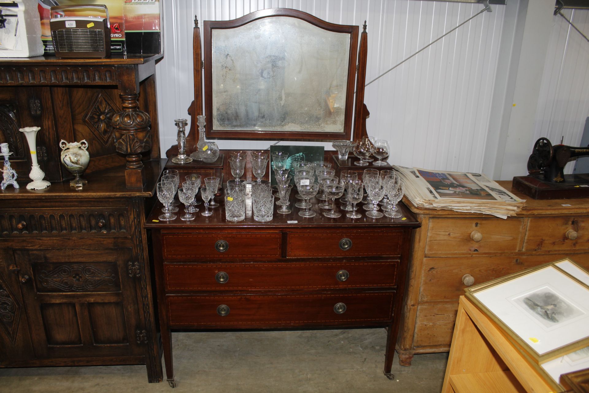 A wooden dressing table with swing back mirror fit