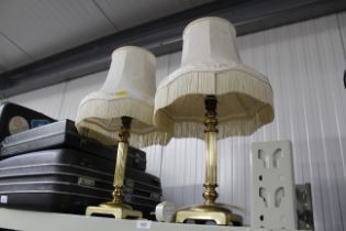 A pair of table lamps on column bases, with matchi