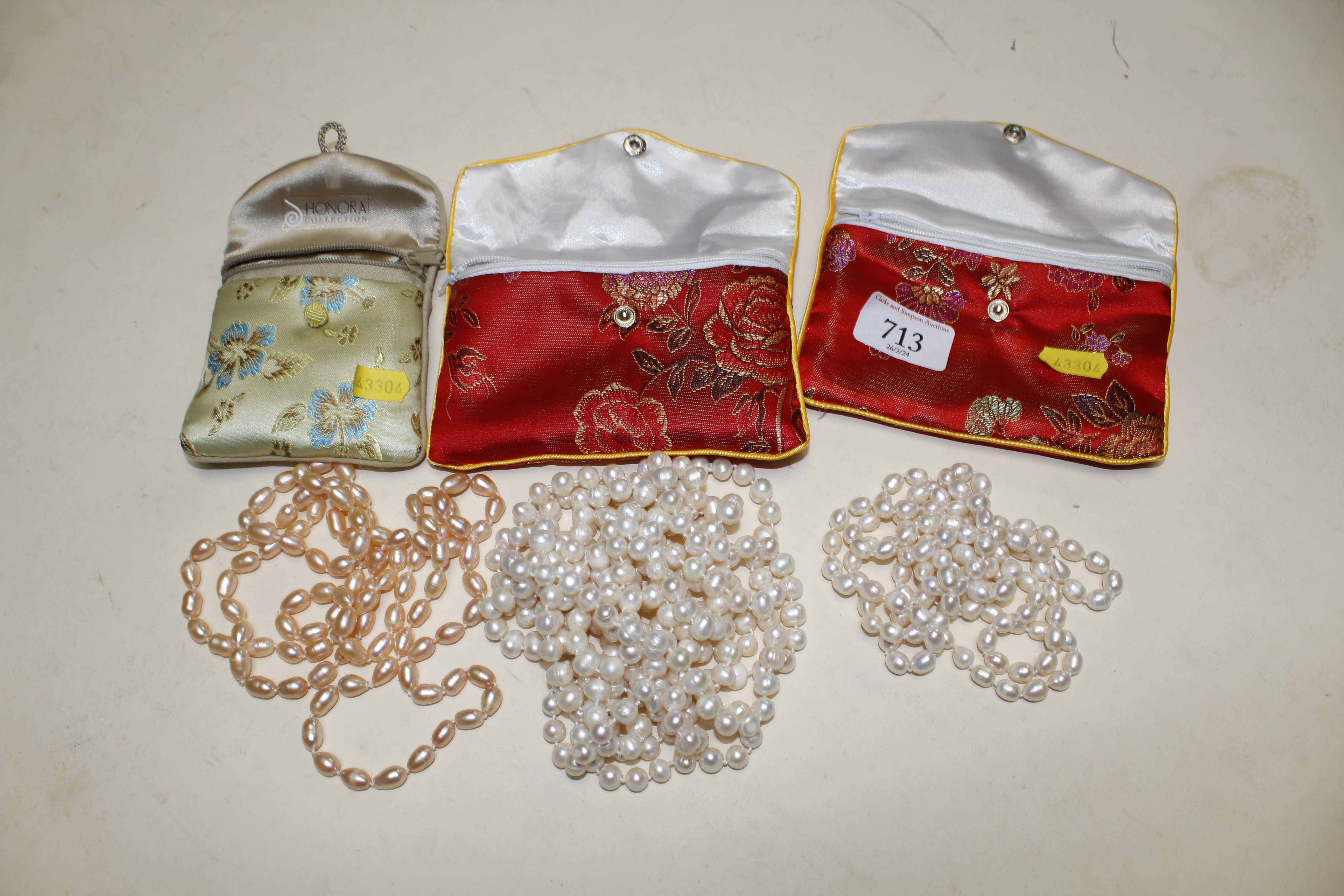 Three extra long necklaces in carry bags - Image 2 of 2