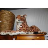 A large cuddly toy in the form of a leopard