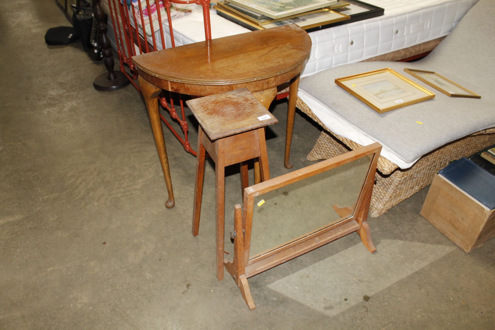 A swing toilet mirror, a plant pot stand and a dem