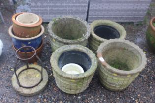 Two pairs of concrete garden planters and a quanti
