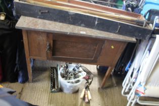 A marble topped wash stand fitted with cupboard be