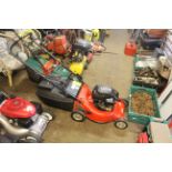 A Rover rotary lawn mower with Briggs & Stratton Q