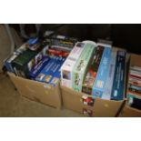 Two boxes of various board games, jigsaws etc