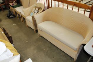 A Lloyd Loom suite comprising two seater settee an