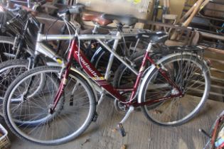 A ladies Claude Butler Knightsbridge bicycle with front and rear mudguards, rear pannier rack,