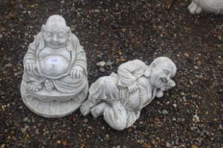 Two cast concrete garden statues in the form of Bu