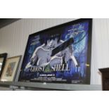 A large advertisement poster "Ghost in the Shell"