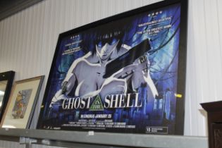 A large advertisement poster "Ghost in the Shell"