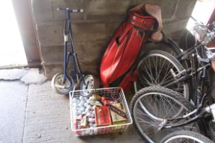 A vintage Slazenger red leather golf bag, folding