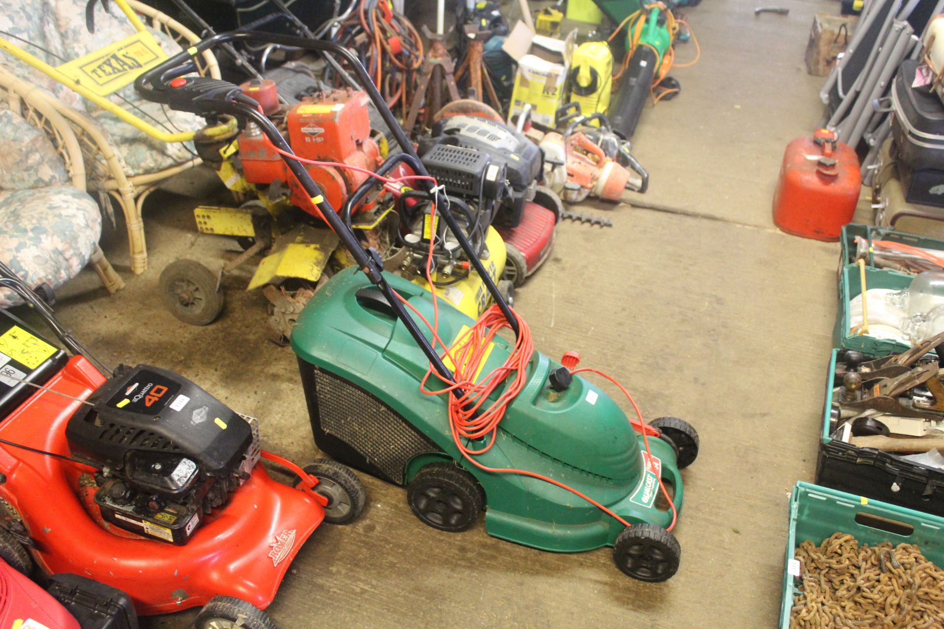 A Qualcast Power-Trak 34 electric lawn mower