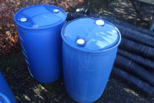 Two 40 gallon plastic containers