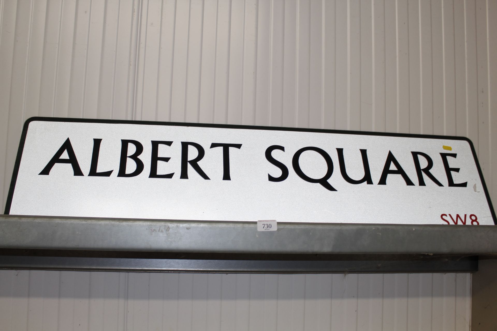 A novelty sign for Albert Square SW8 of London