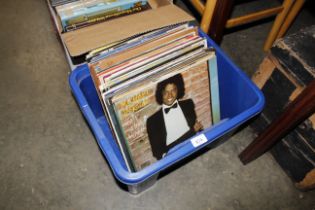 A box containing various records to include Bruce